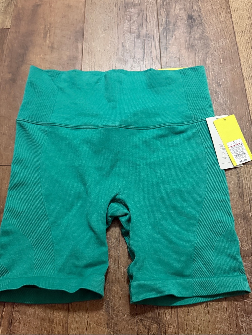 all in motion Women's High-Rise Bike Shorts in Teal Green